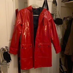 Shiny red topshop raincoat